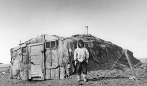 An Inuvialuit person and his home