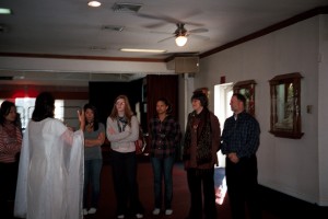 Lakshmi (on left) explains speaks to the Lived Religion class from Dickinson College about the HARI Temple
