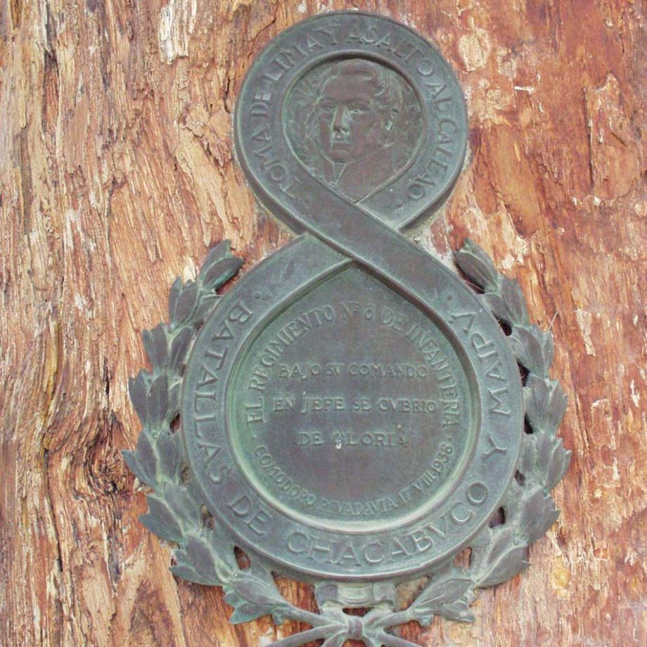 Plaque on San Martin bust in front of YPF offices